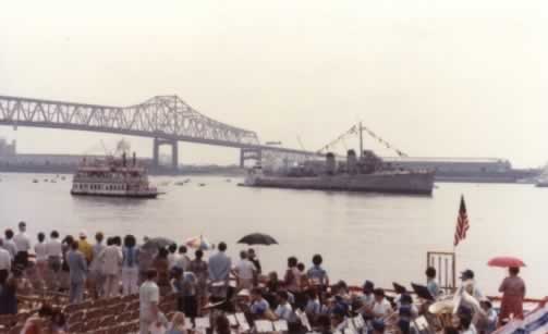 USS Kidd arrival at downtown Baton Rouge, with Samuel Clemens and I-10 bridge on May 23, 1982
