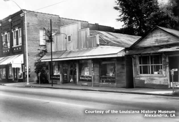 Main Street, Pineville, Louisiana, showing Economy Grocery store and the Masonic Hall on the left, Berwick Drug Store in the middle, and Eddies Bar-B-Q on the right. Main Street, Pineville, Louisiana, showing Economy Grocery store and the Masonic Hall on the left, Berwick Drug Store in the middle, and Eddies Bar-B-Q on the right.