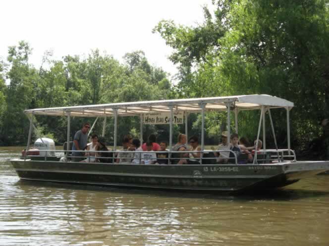 Flat-bottom tour boat in the Honey Island swamp in Louisiana