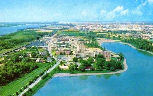 View to the north from the Louisiana State Capitol (circa early 1970s), showing Our Lady of the Lake Hospital and the ESSO oil refinery in the distance